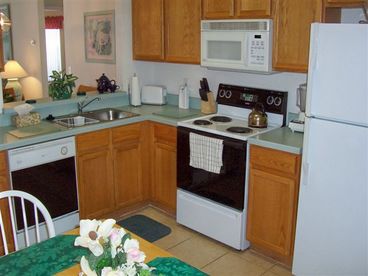 The bright fully equipped Kitchen.