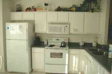 The fully-equipped bright & airy Kitchen is perfect for preparing the family meals.