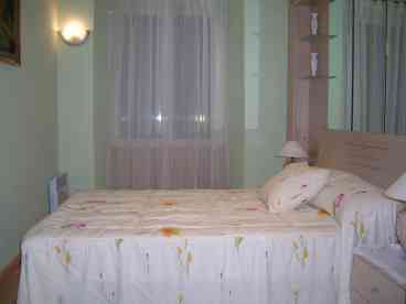 comfortable double bedroom, with view to Puerta del Sol.