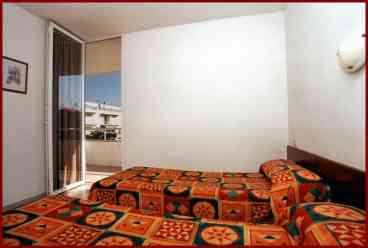 Bedroom leading on to balcony