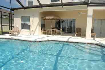 Let the kids have a great time in the pool while you relax on the sunloungers and top up that suntan