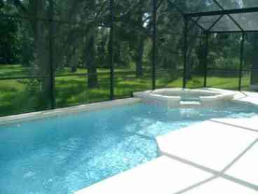View of the pool and jacuzzi, just imagine after a long day at the theme parks relaxing in the crystal blue waters of the pool or jacuzzi with a glass of champagne.