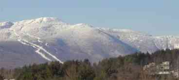 That's us - nestled right under the ski hill - but convenient to shopping, restaurants, walking, and just plain hanging out!