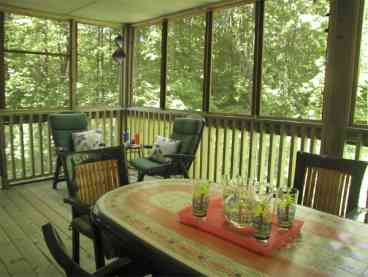 Gracious living and dinning on our lovely porch with it's view of the birches that fill the mountainside. Keep your eyes peeled for the friendly fox that sometimes drops by to say hi!