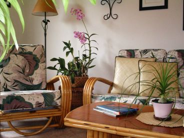 Old Hawaiian style vintage rattan graces the living room