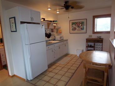 Eating in is an option with this kitchen. Table seats four.