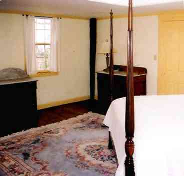 Master bedroom. Federalist period paneling throughout is orignal.
