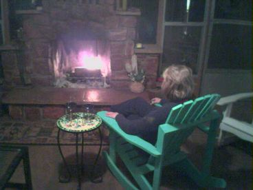 Romantic Arizona or Breezeway Room with wood burning red rock fireplace and futon for sleeping.