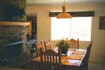 Master House Dinning Room with wood burning fireplace.