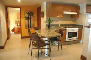 Granite counter tops.  Breakfast bar, dishwasher, microware, coffeemaker, toaster/oven.  all kitchen utensiles.