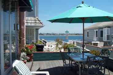 Large Wooden Deck for relaxing and watching people go by on Bayside Lane