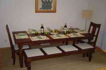 Dining room features seating for 8.