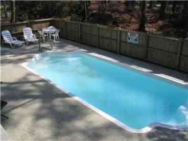 Relax by the pool.  Pool deck has plenty of furniture and loungers for an afternoon picnic or plenty of tanning opportunities.