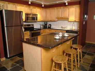 New stainless appliances in the kitchen.