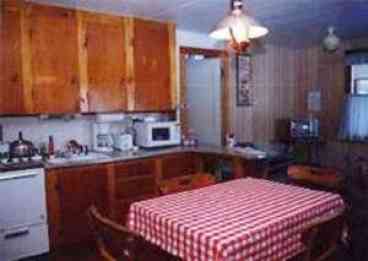 Kitchen and livingroom are open.  Kitchen is well stocked with cooking and baking dishes.