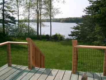 View The Dow Road Waterfront Cottage