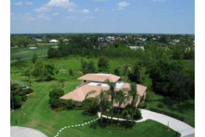 View Estate Pool Home in PGA National