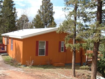 View The Forest House with Pikes Peak