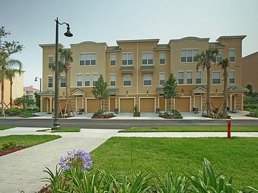 View Brand New Vista Cay Townhome near