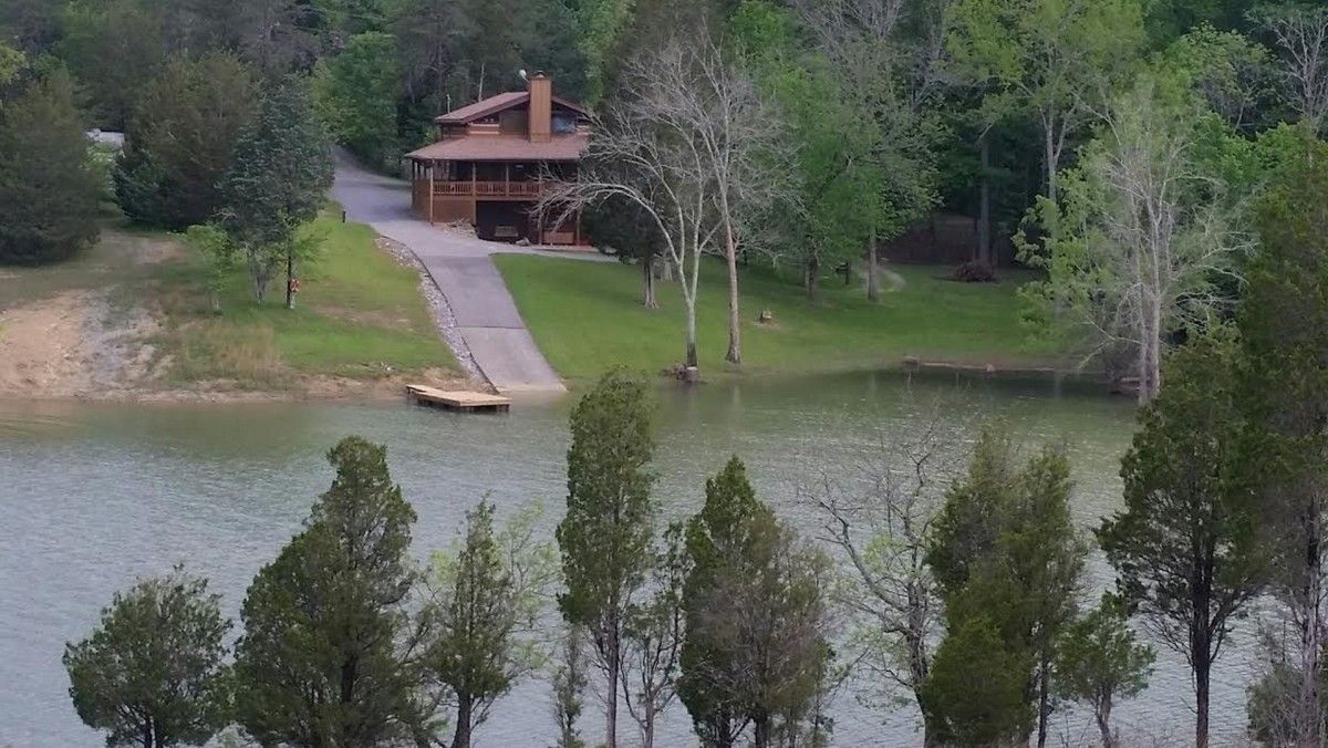 View Driftwood Log Cabin