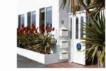 View Romantic Beach Cottage